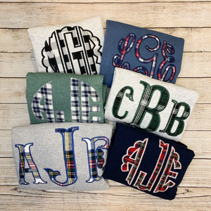 Embroidered sweatshirt with plaid applique monogram